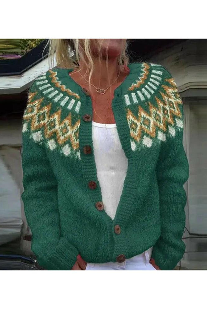 Blue Liorra cardigan by Lumina Wear displayed on a hanger, showing its soft knit texture and relaxed fit.