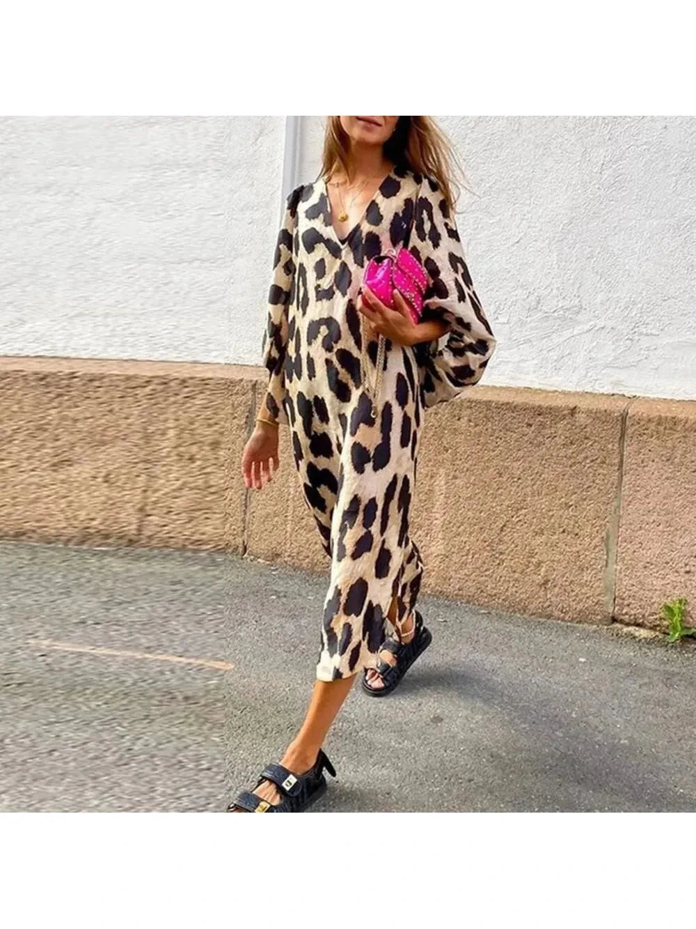 Lisa™ leopard print dress by Lumina Vancouver, showcasing a stylish, fitted dress with bold animal print and elegant design.