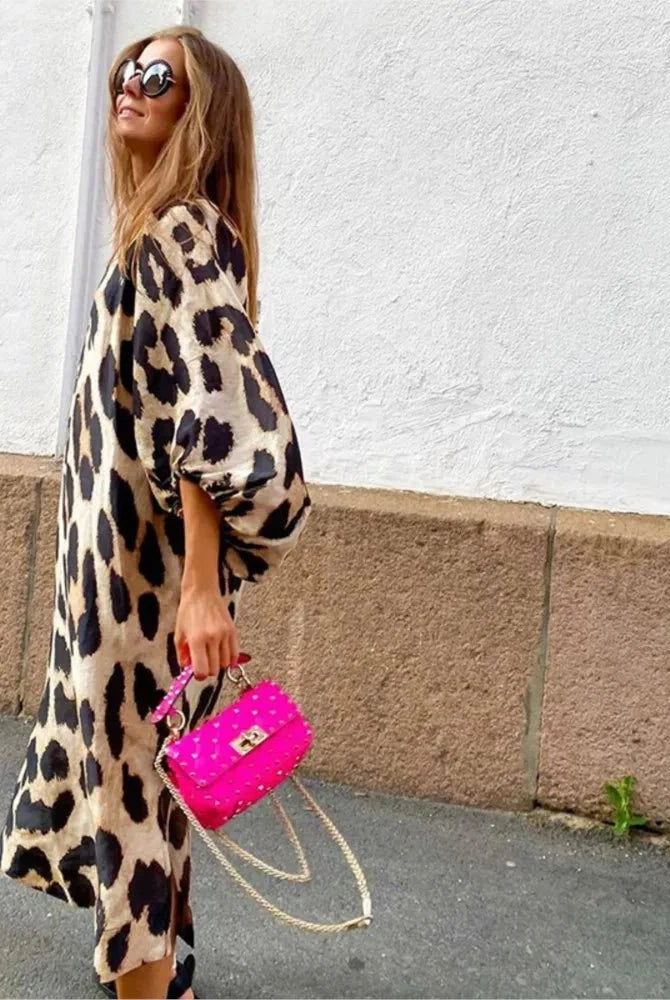 Lumina Vancouver Lisa™ leopard print dress featuring a stylish, fitted silhouette and bold animal print fabric.