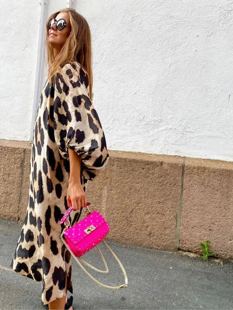 Lumina Vancouver Lisa™ leopard print dress featuring a stylish, fitted silhouette and bold animal print fabric.