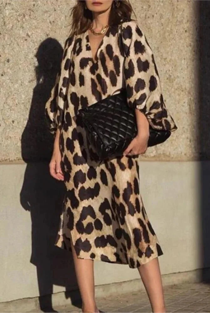 Lisa™ Leopard Print Dress by Lumina Vancouver featuring stylish leopard pattern and elegant fit on a model.