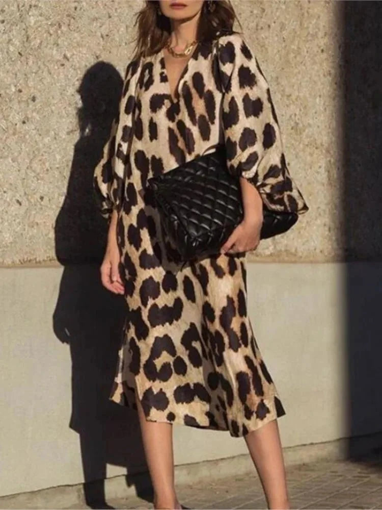 Lisa™ Leopard Print Dress by Lumina Vancouver featuring stylish leopard pattern and elegant fit on a model.