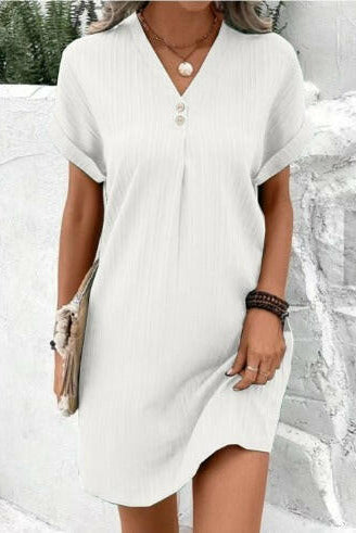 Green LISA™ V-neck spring dress by Lumina Wear, stylish and lightweight, perfect for warm weather and casual outings.