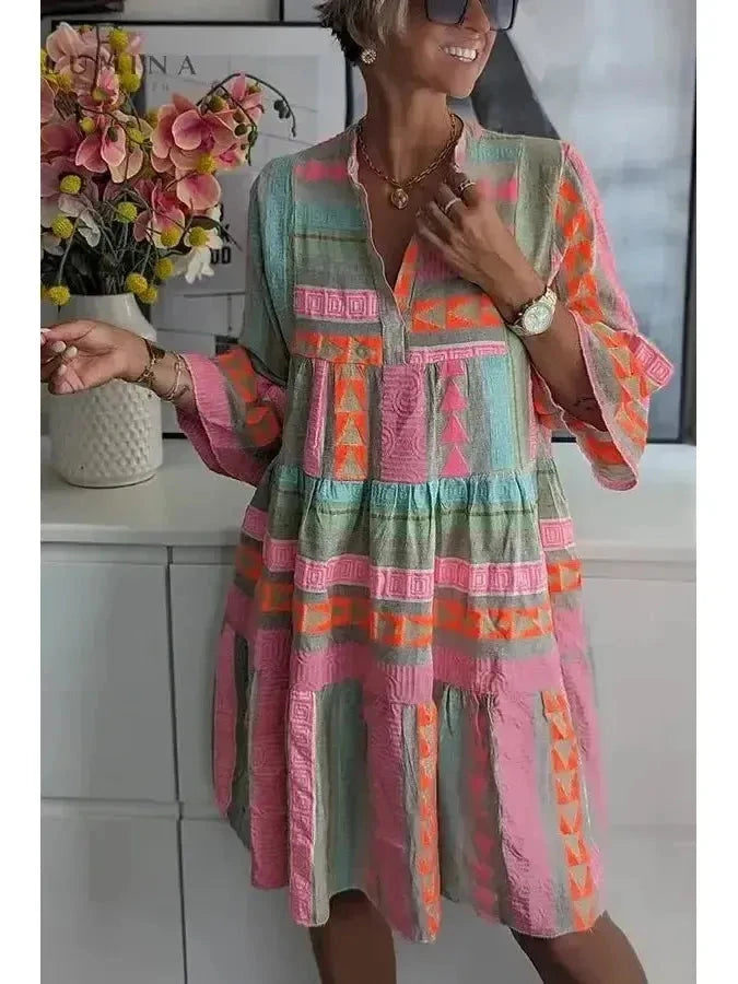 Lissie spring dress by Lumina Vancouver featuring lightweight fabric, floral pattern, and a flattering fit for warm weather.