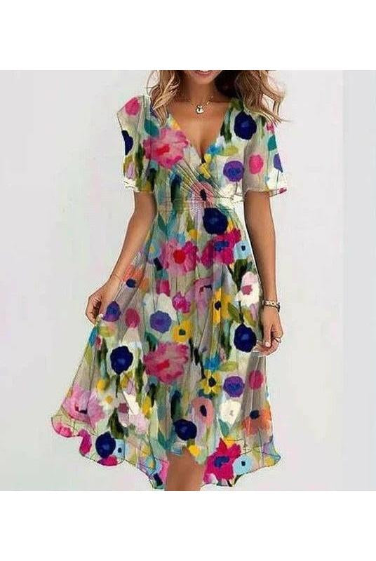 Vibrant abstract midi dress by Lumina Wear featuring multicolored patterns and a flowing silhouette.