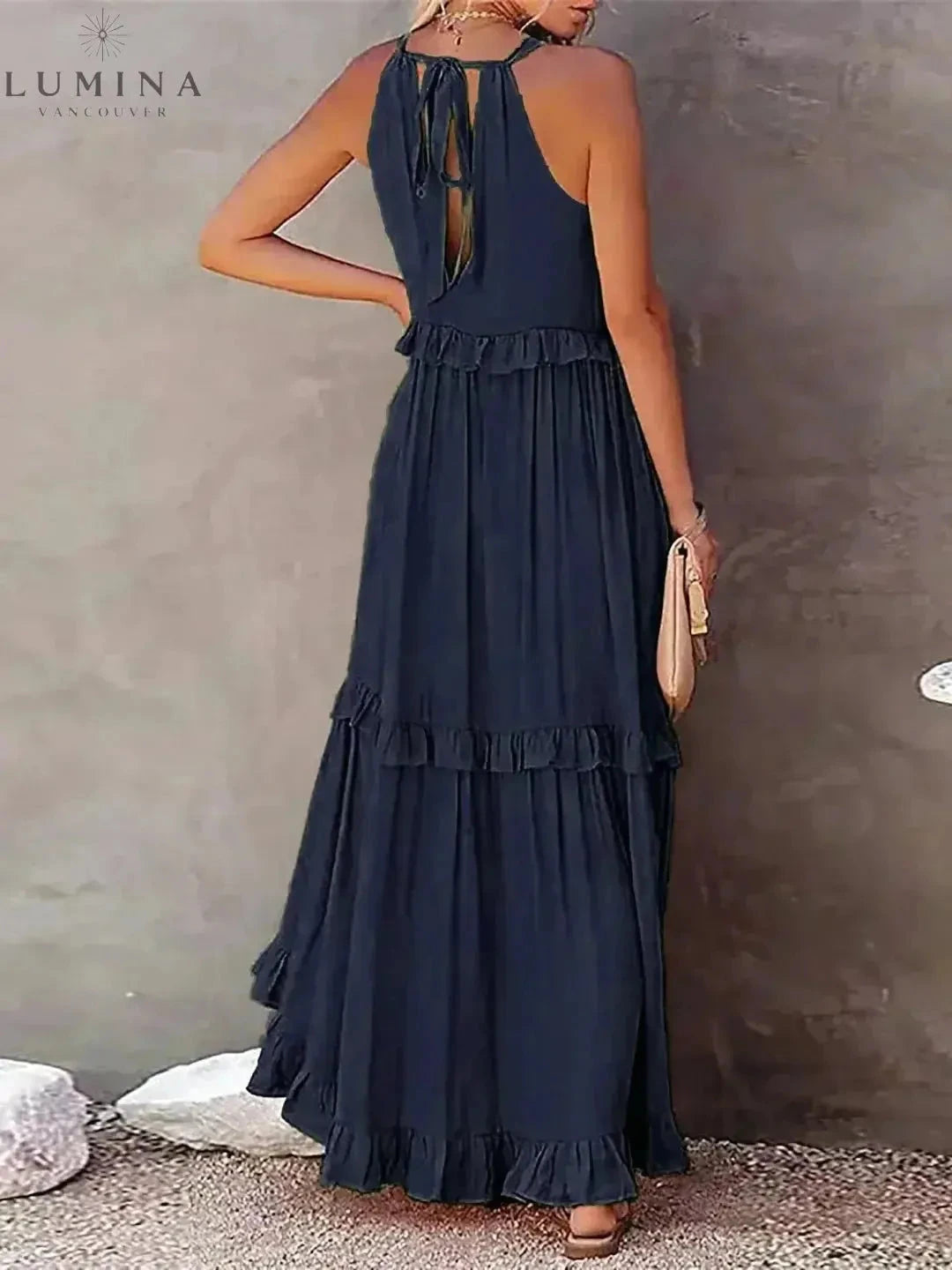 Lorena halterneck dress by Lumina Wear featuring ruffles, pockets, in apricot, perfect for holiday vibes and summer outings.
