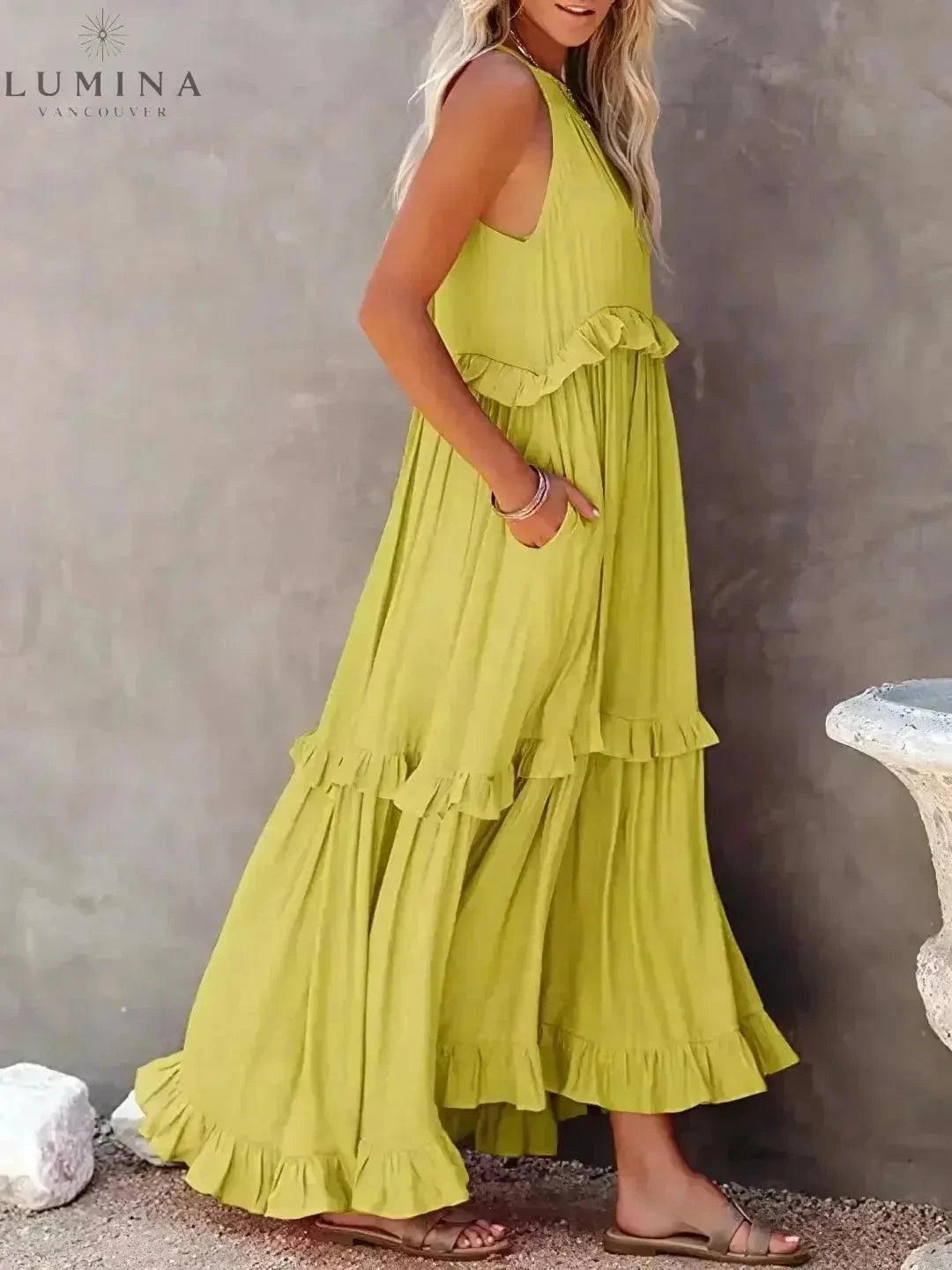 Lorena halterneck dress with ruffles and pockets in apricot, perfect for holiday vibes, by Lumina Wear.