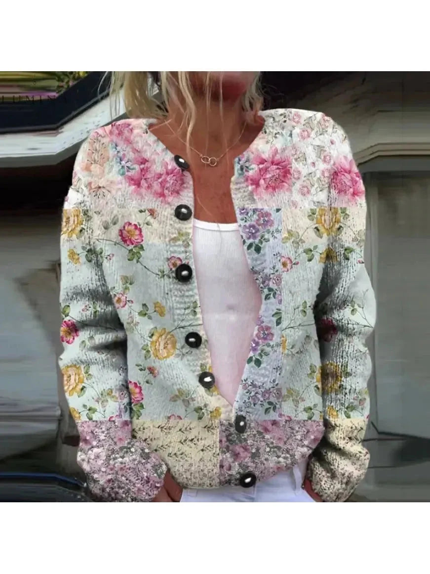 Light pink flower print cardigan by Lumina Vancouver, featuring a soft knit fabric and floral pattern, size S.