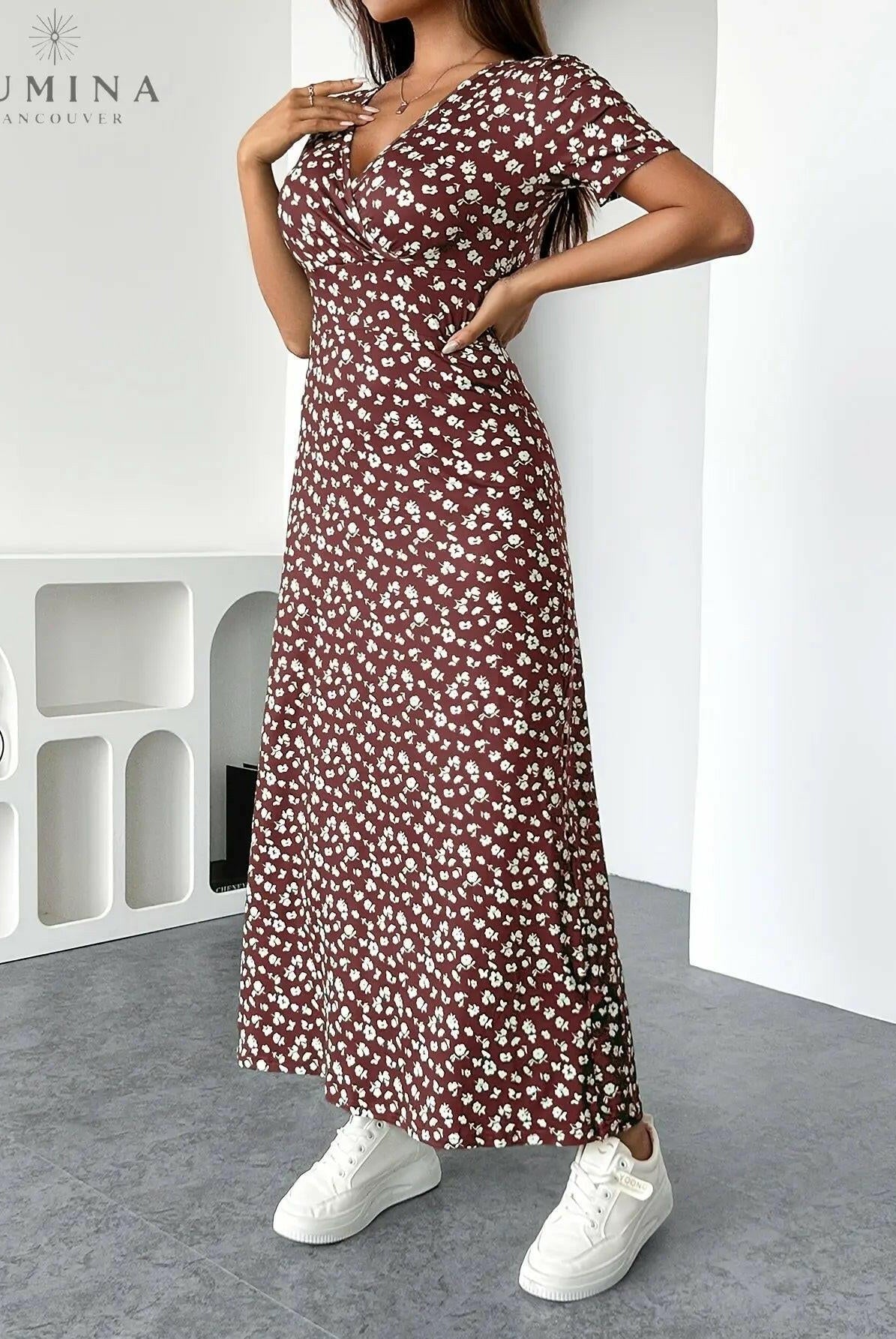 Green floral knit dress called Lucia by Lumina Vancouver, shown on a model with a fitted silhouette and elegant design.
