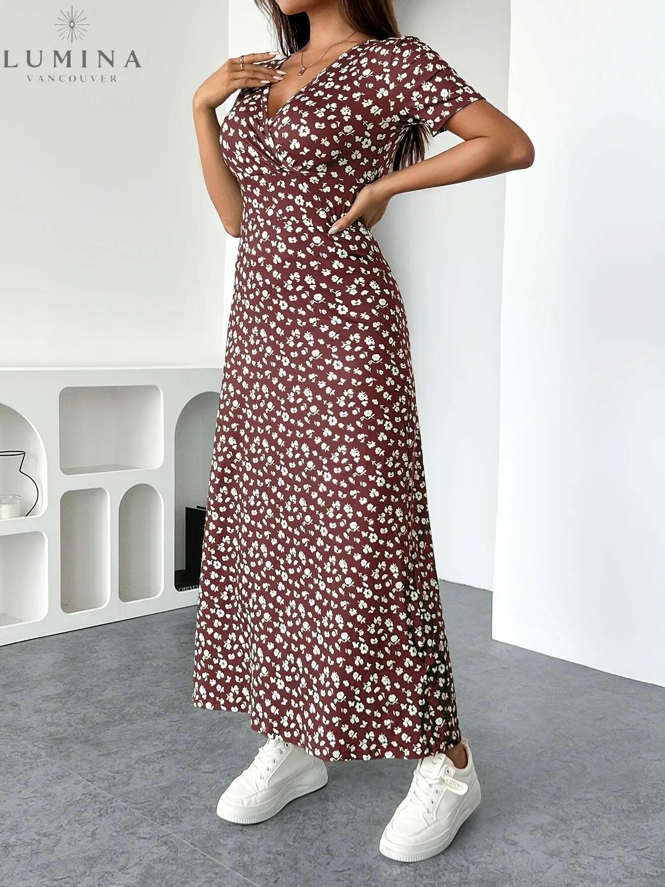 Green floral knit dress called Lucia by Lumina Vancouver, shown on a model with a fitted silhouette and elegant design.