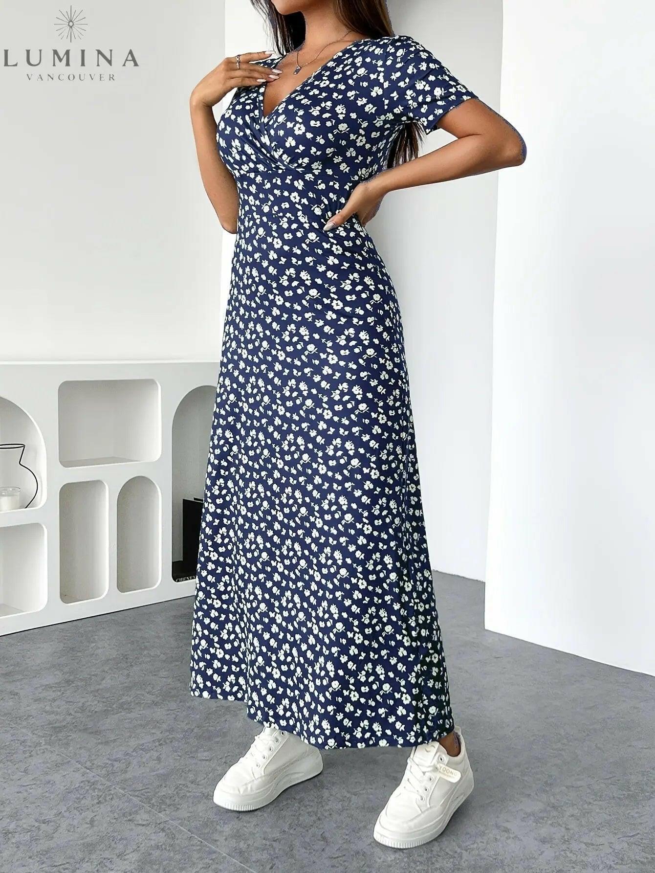 Green Lucia floral knit dress by Lumina Vancouver, showing a close-up of the elegant, patterned fabric and fitted style.