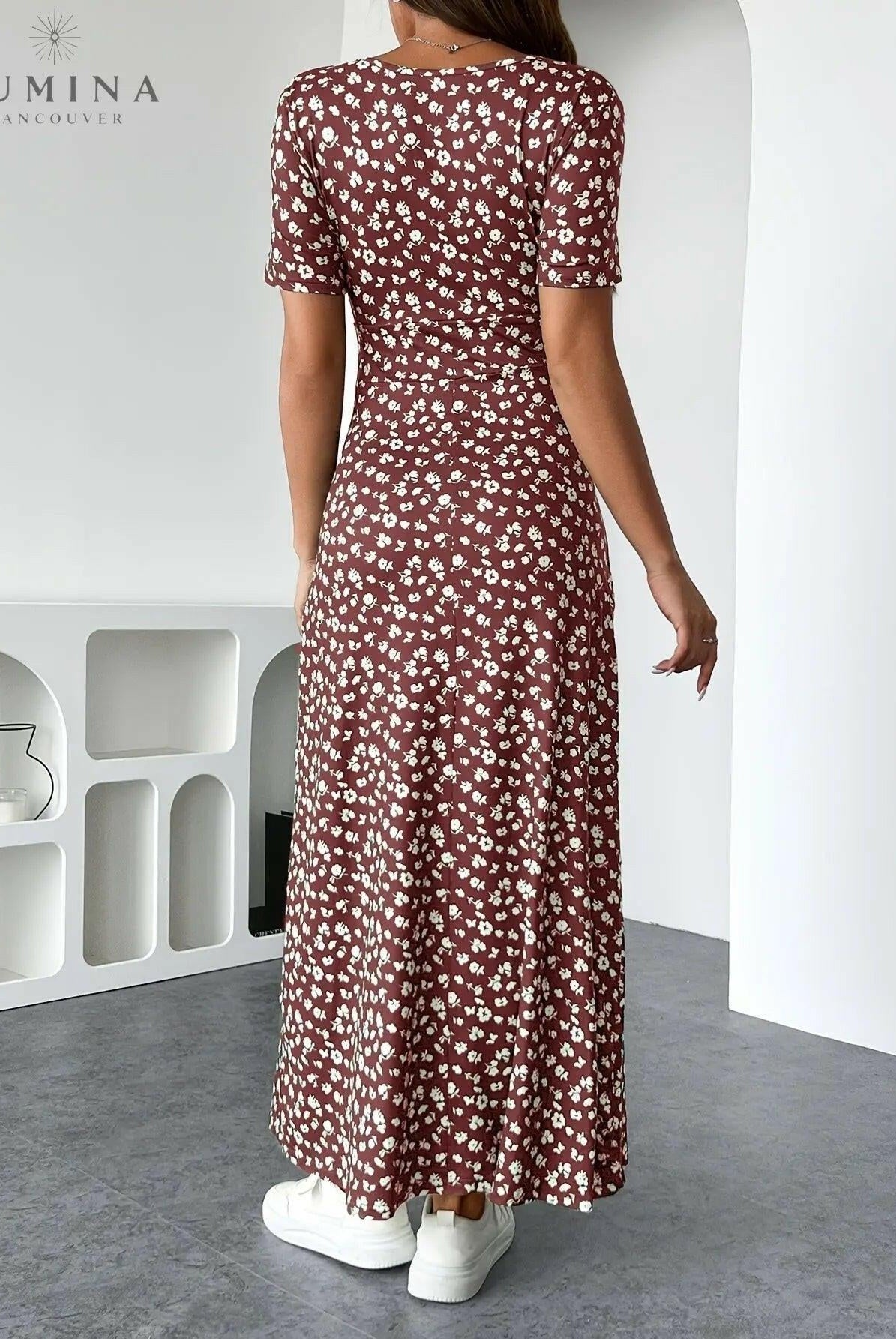 Green floral knit dress named Lucia by Lumina Vancouver, showing the elegant design and detailed floral pattern.