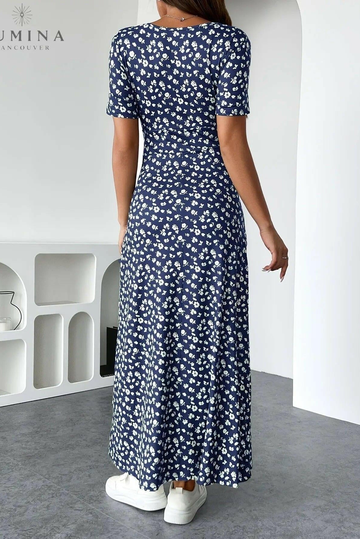 Green Lucia floral knit dress by Lumina Vancouver, showing a fitted silhouette with intricate floral patterns and soft knit fabric.