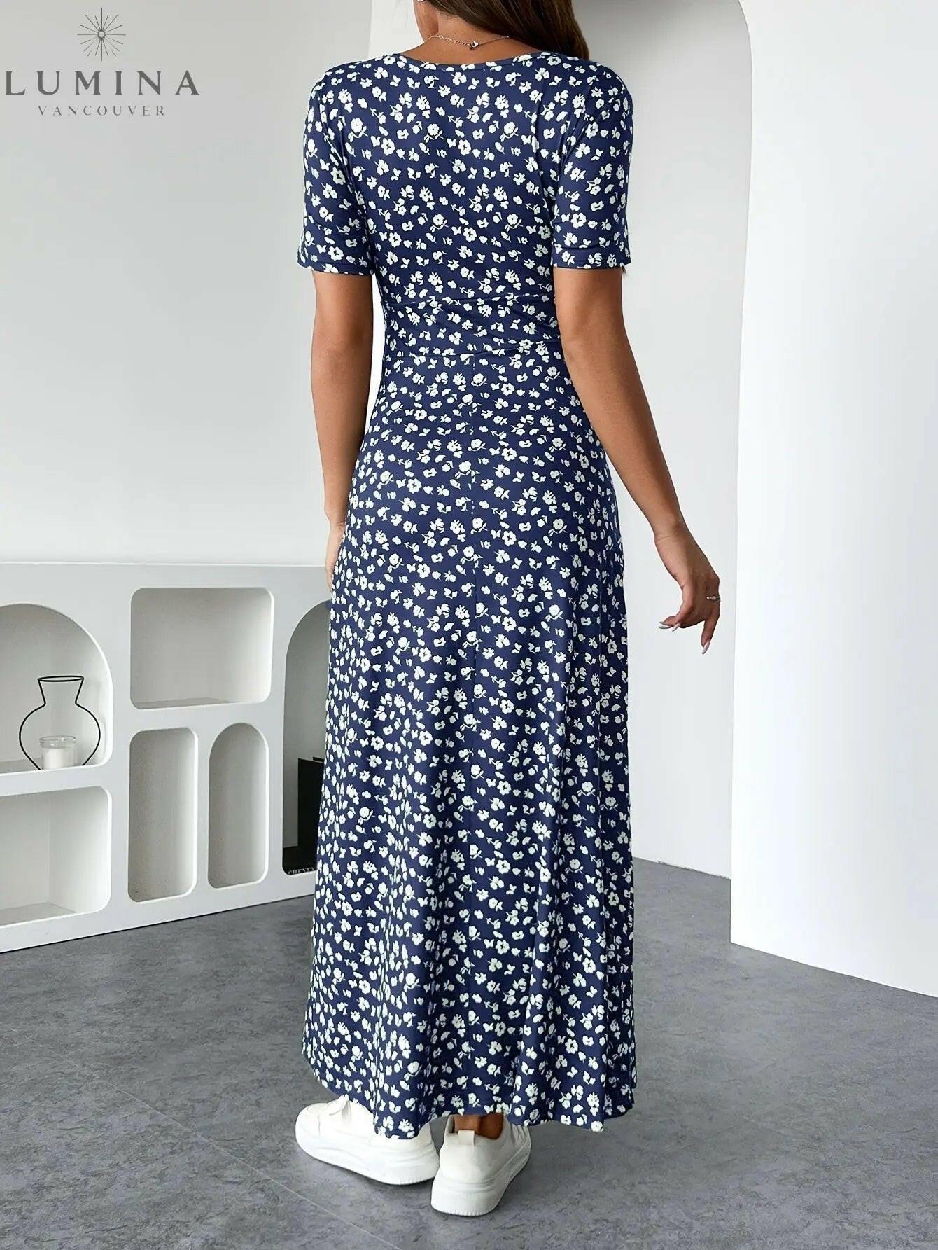Green Lucia floral knit dress by Lumina Vancouver, showing a fitted silhouette with intricate floral patterns and soft knit fabric.