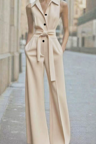 Orange sleeveless jumpsuit by Lumina Vancouver, featuring a fitted design and stylish modern silhouette.