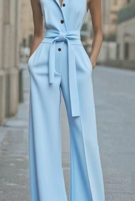 Orange sleeveless jumpsuit by Lumina Vancouver, featuring a fitted design and stylish wide-leg silhouette.