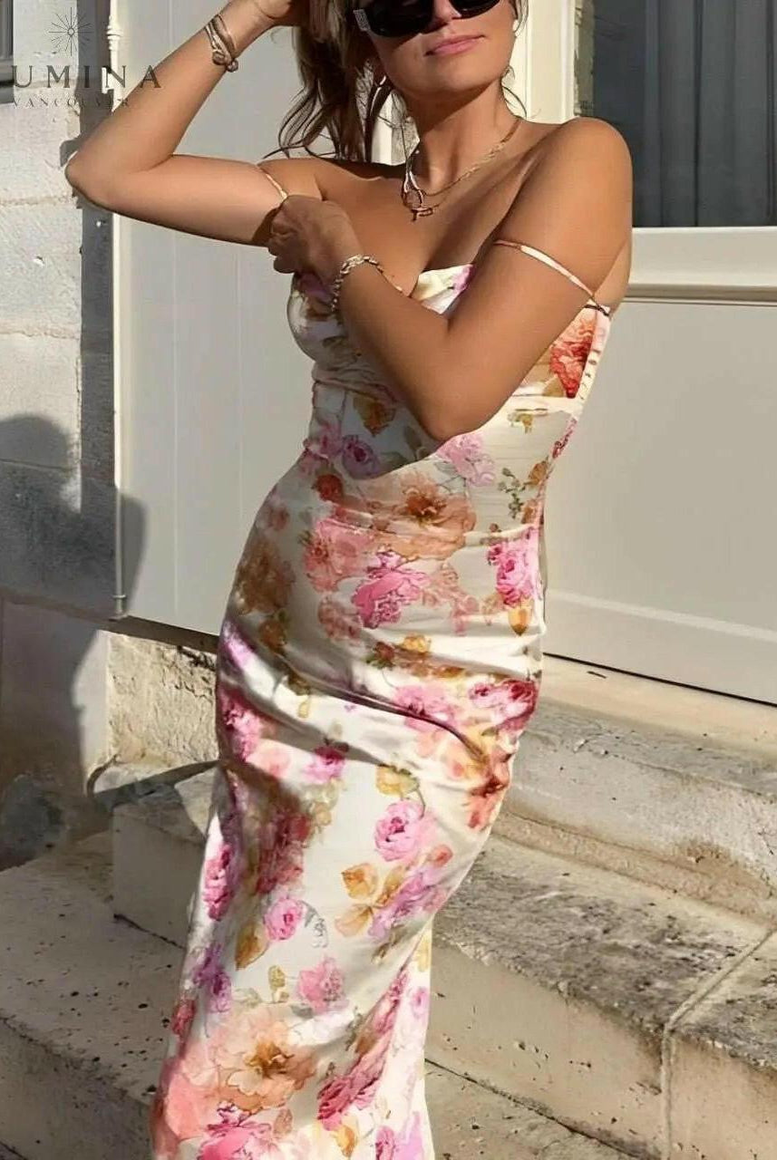 Lucy floral satin maxi dress by Lumina Wear, shown in size XS with a flowing floral pattern and elegant satin fabric.