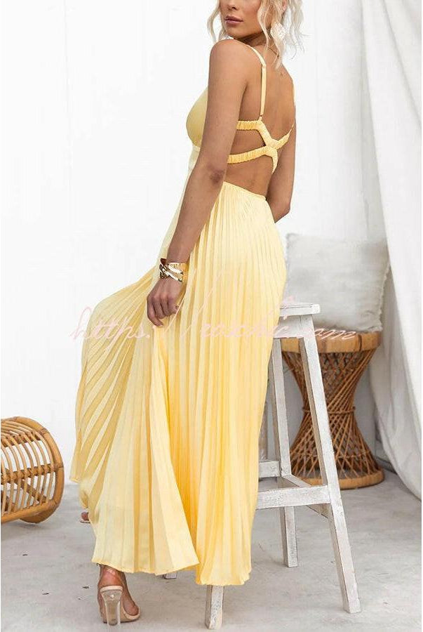 Yellow Lucy pleated dress by Lumina Vancouver, showcasing elegant fabric and stylish design in a full-length image.