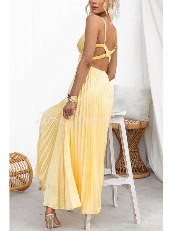 Yellow Lucy pleated dress by Lumina Vancouver, showcasing elegant fabric and stylish design in a full-length image.