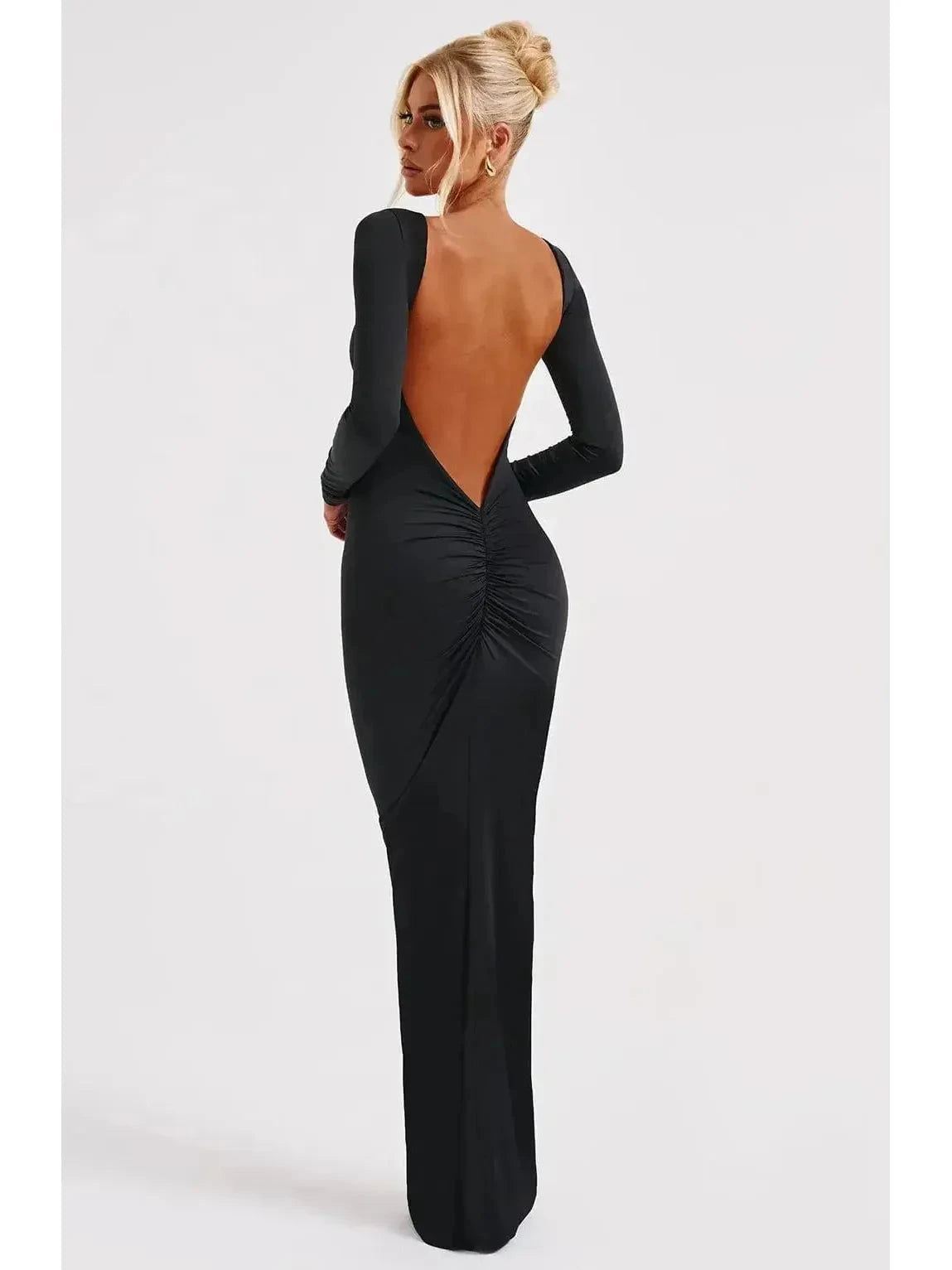 Lumina Vancouver Evanna boat-neck backless maxi dress in XS, flowing fabric, elegant design, worn by a model showcasing style.