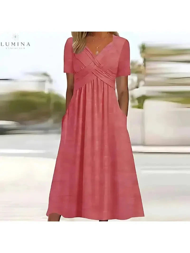 Lumina Vancouver Leila green elegant dress with tummy coverage, featuring a fitted silhouette and stylish design.