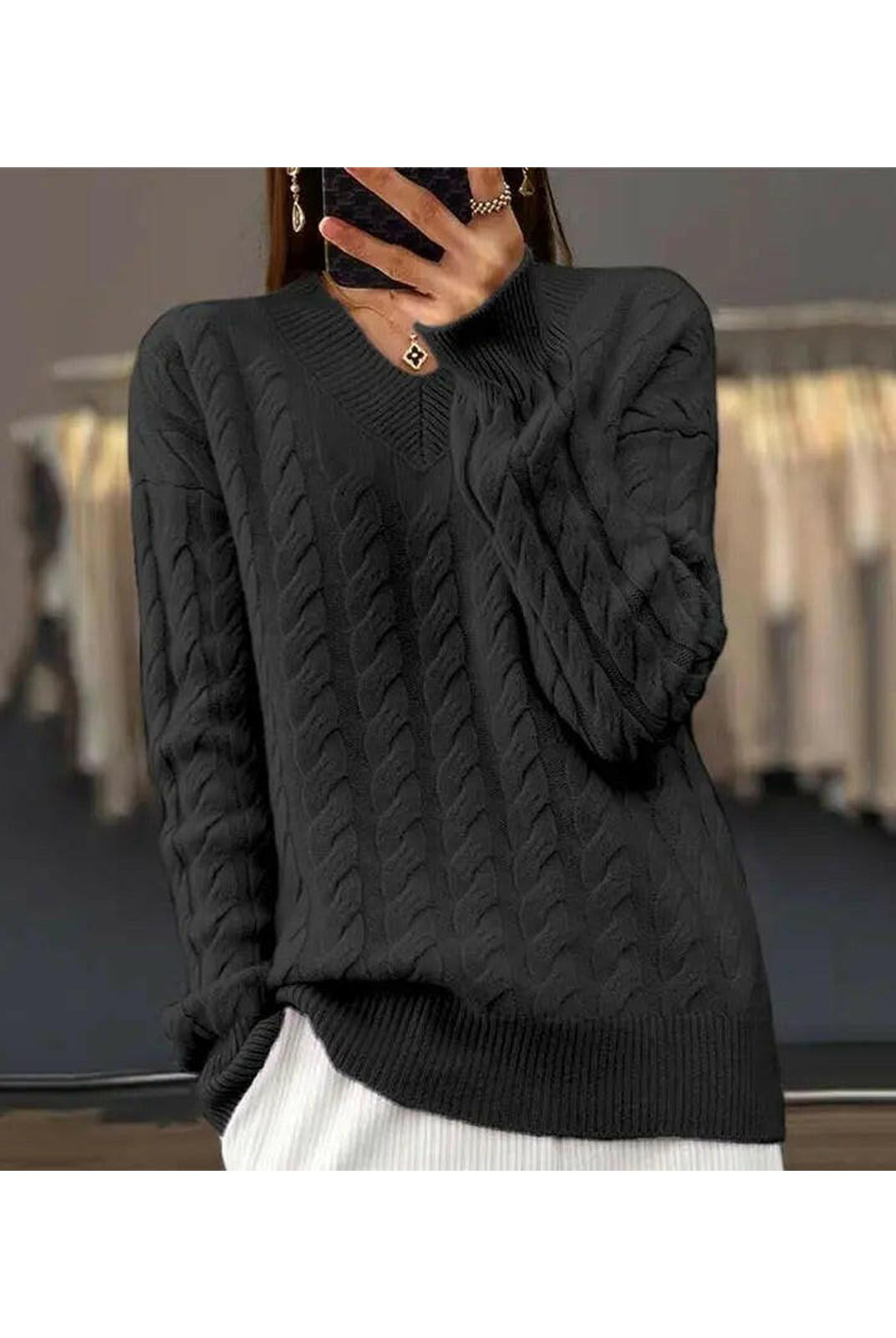 Lumina Wear Rona cable knit sweater in apricot color, showcasing a cozy, textured knit design perfect for casual wear.