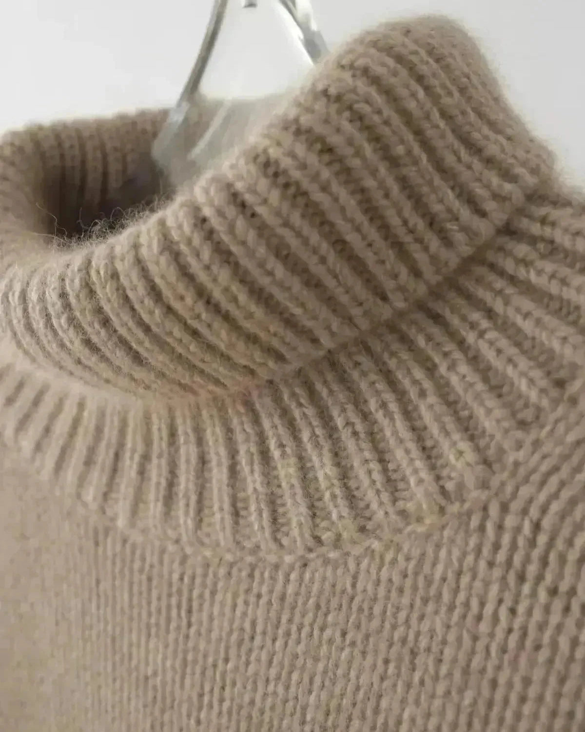 Beige Lena Turtleneck Sweater by Lumina Wear, featuring a cozy knit design and a relaxed fit for casual comfort.