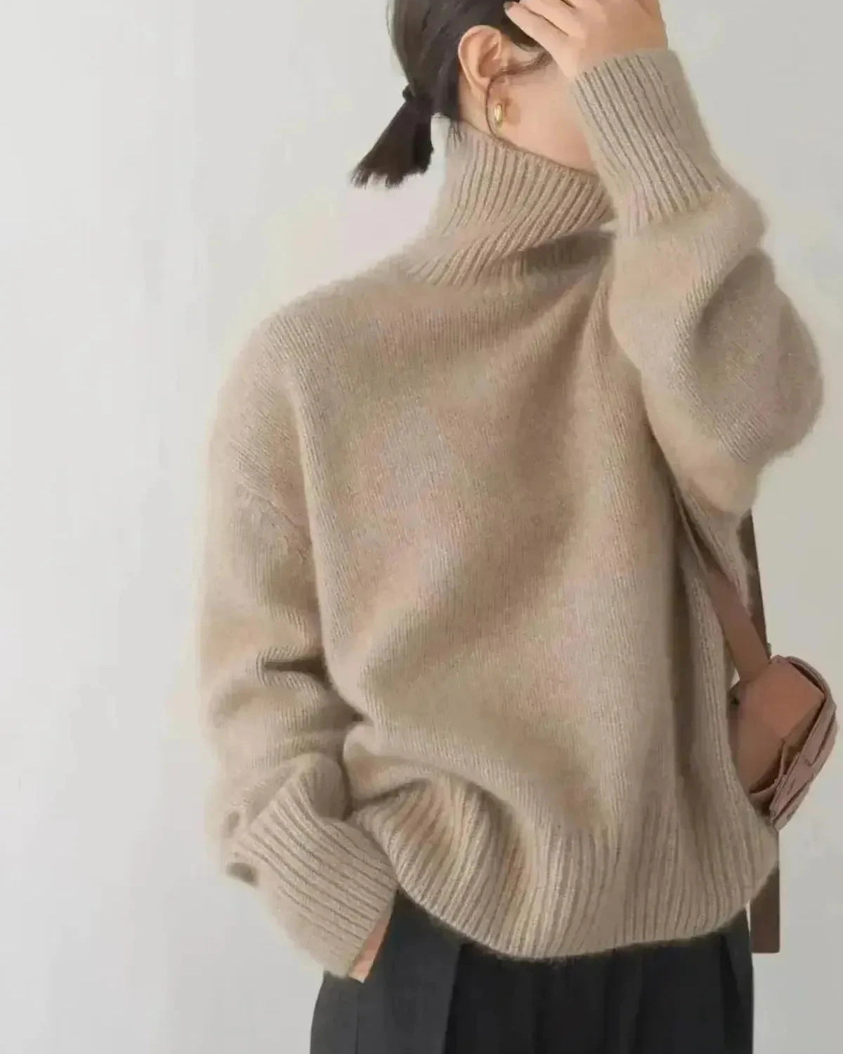 Lumina Wear beige Lena turtleneck sweater, cozy knit sweater for women, shown on a model with a neutral background.