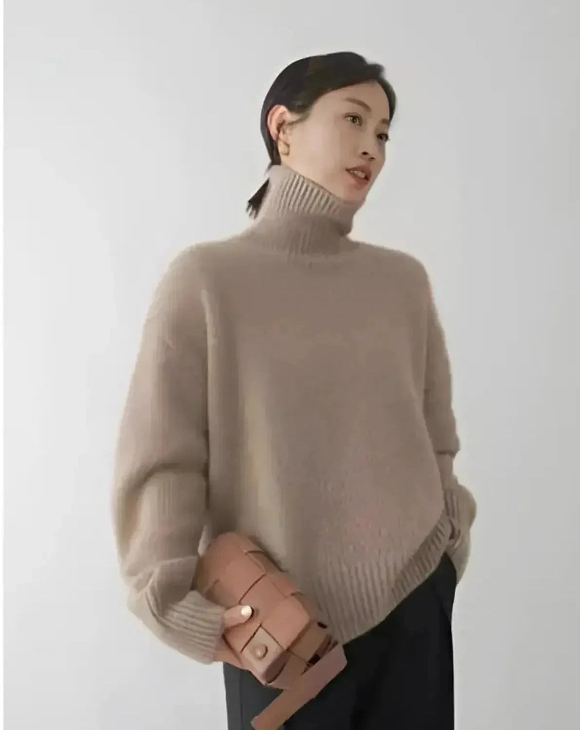 Lumina Wear Lena beige turtleneck sweater, cozy knit with a relaxed fit, showcased on a neutral background.