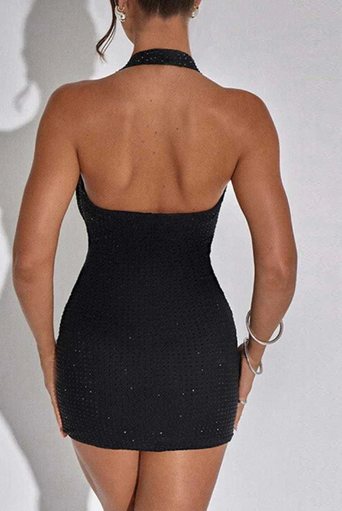 Black Lumina Vancouver Nova sequin bodycon mini dress, close-up of fitted design with shimmering sequins and elegant neckline.