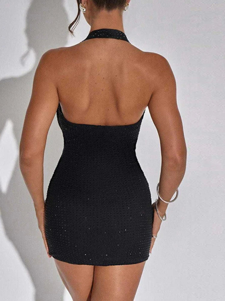 Black Lumina Vancouver Nova sequin bodycon mini dress, close-up of fitted design with shimmering sequins and elegant neckline.