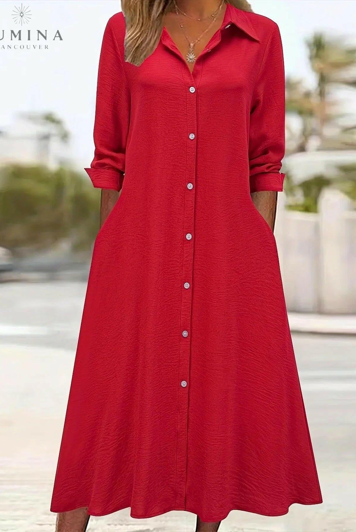 Black Charlotte button front shirt dress by Lumina Vancouver, featuring a classic collar, long sleeves, and a relaxed fit.