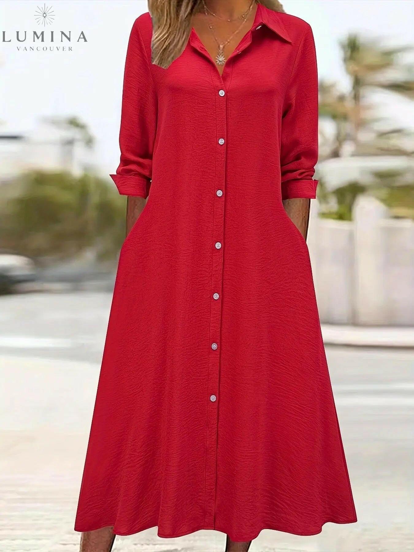 Black Charlotte button front shirt dress by Lumina Vancouver, featuring a classic collar, long sleeves, and a relaxed fit.