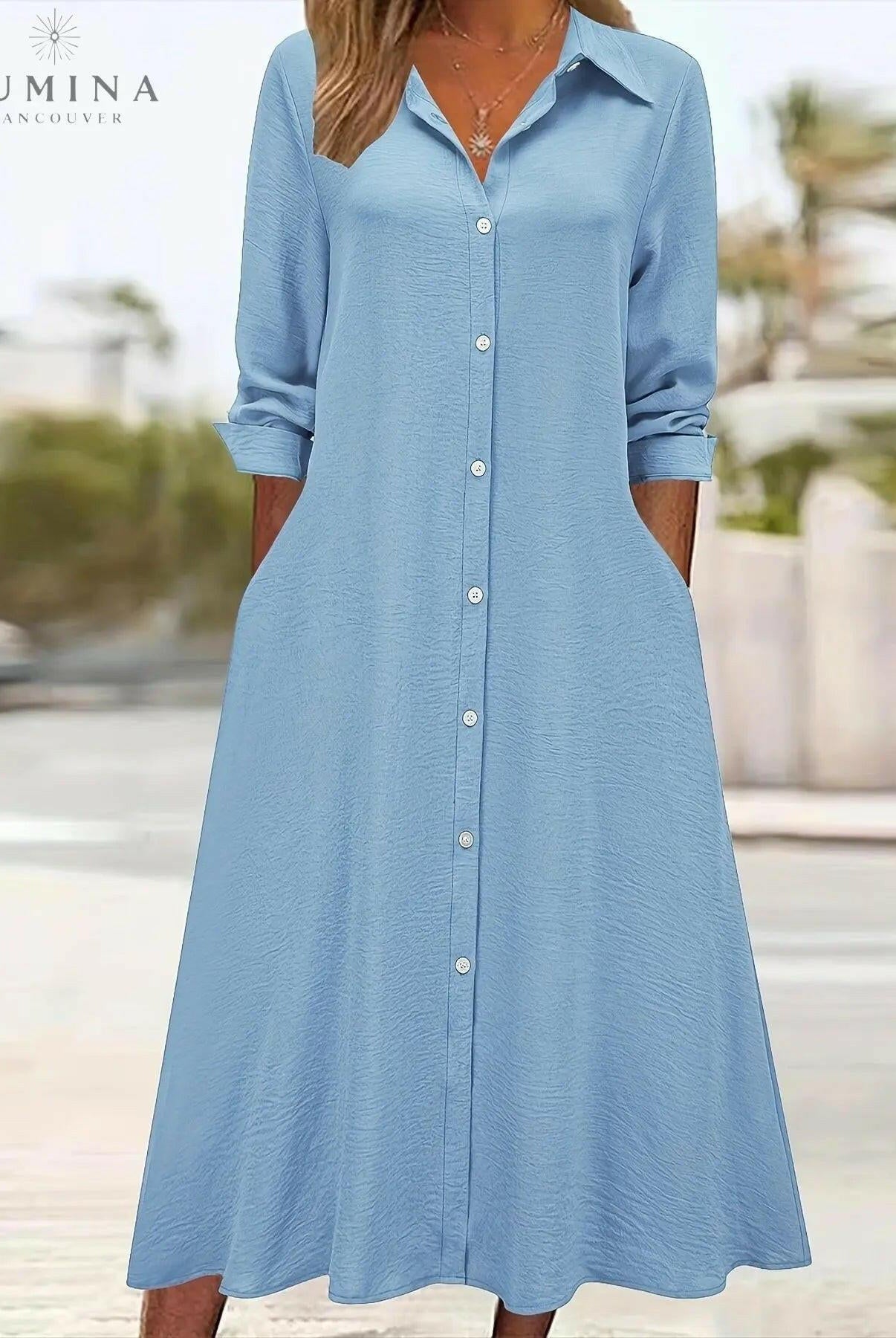 Black Charlotte Button Front Shirt Dress by Lumina Vancouver, shown with long sleeves and a classic collar, styled for casual wear.
