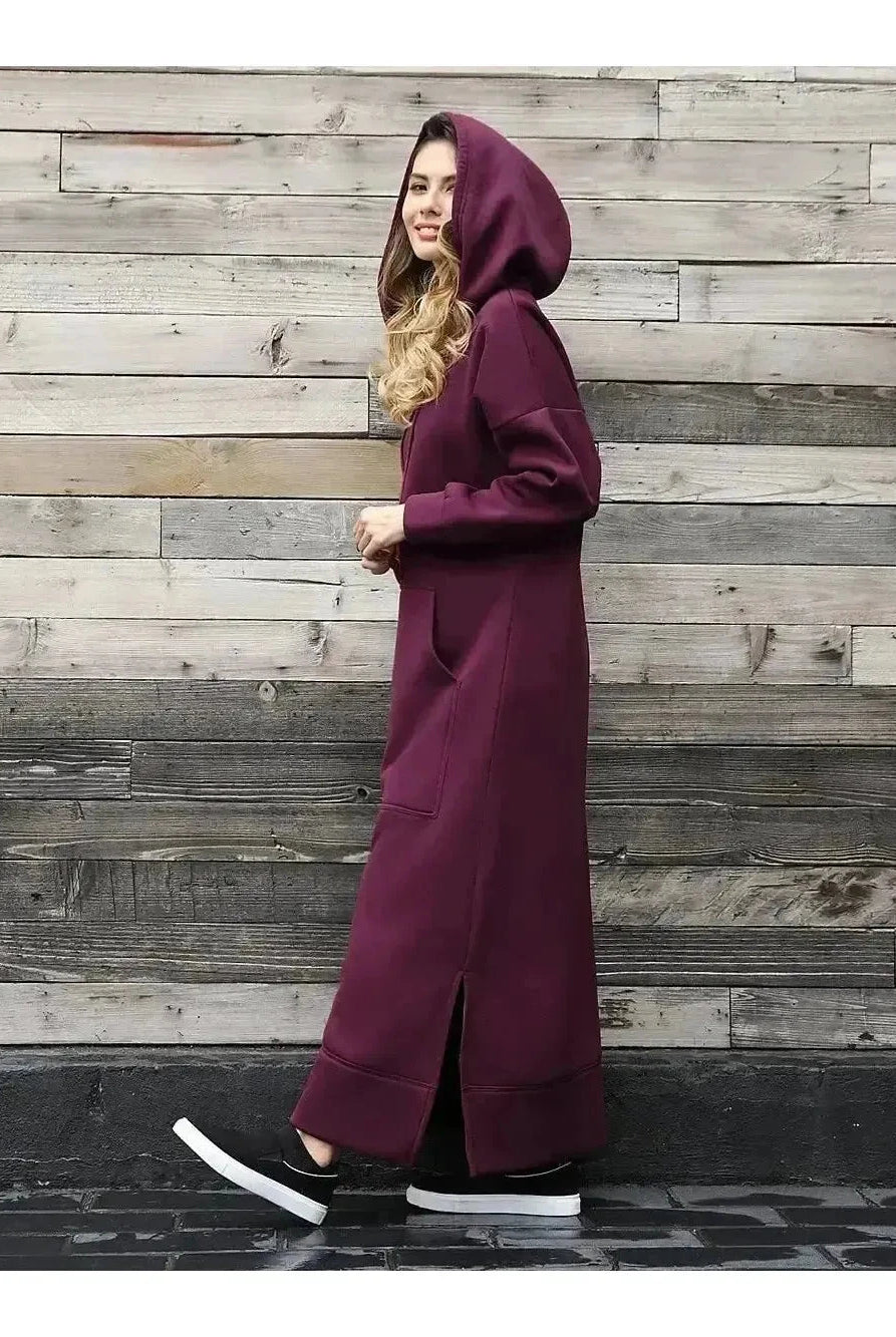 Black Lumina Vancouver Elisa hooded dress with long sleeves and a relaxed fit, shown on a mannequin.