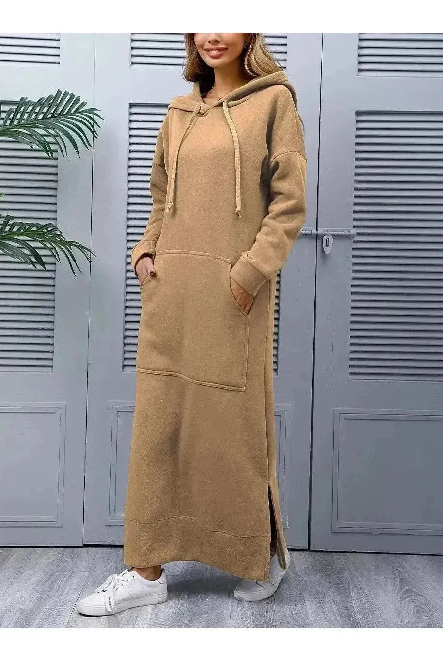 Black Elisa hooded dress by Lumina Vancouver, featuring a relaxed fit and adjustable hood, made from soft, comfortable fabric.