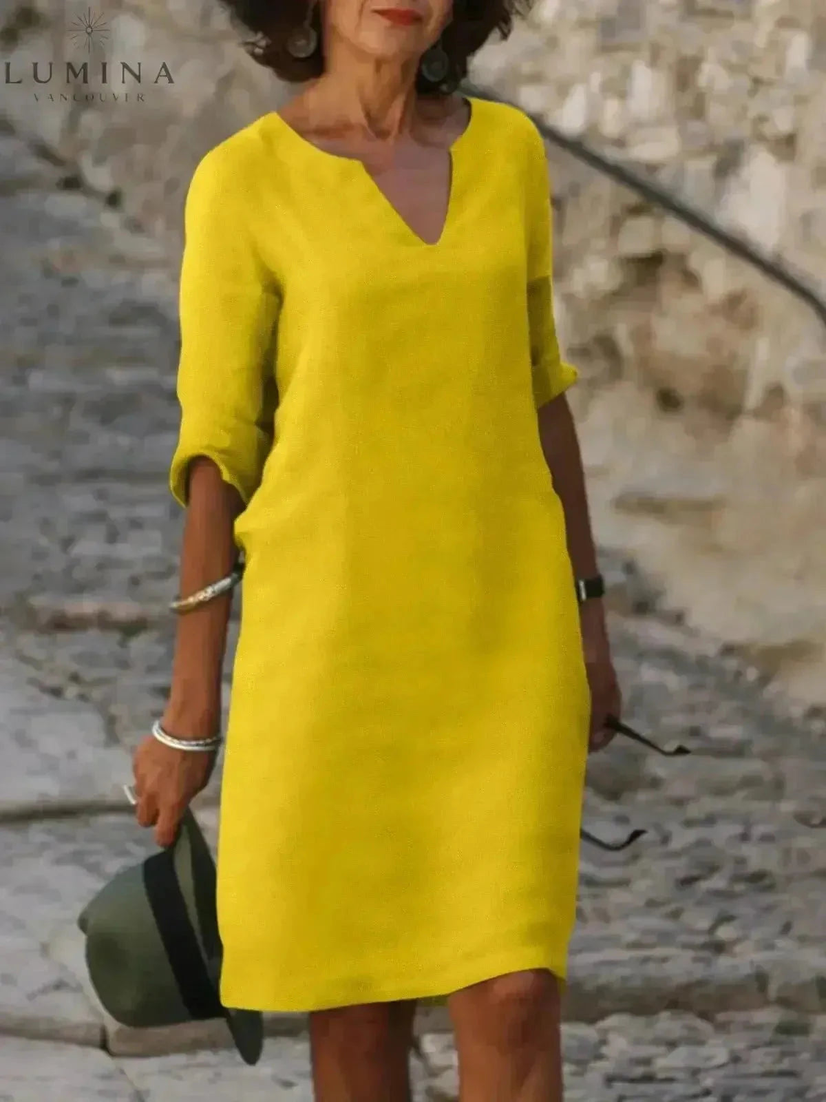 Black Lumina Vancouver Suzan elegant dress with V-neckline, featuring a stylish and sophisticated design for women.