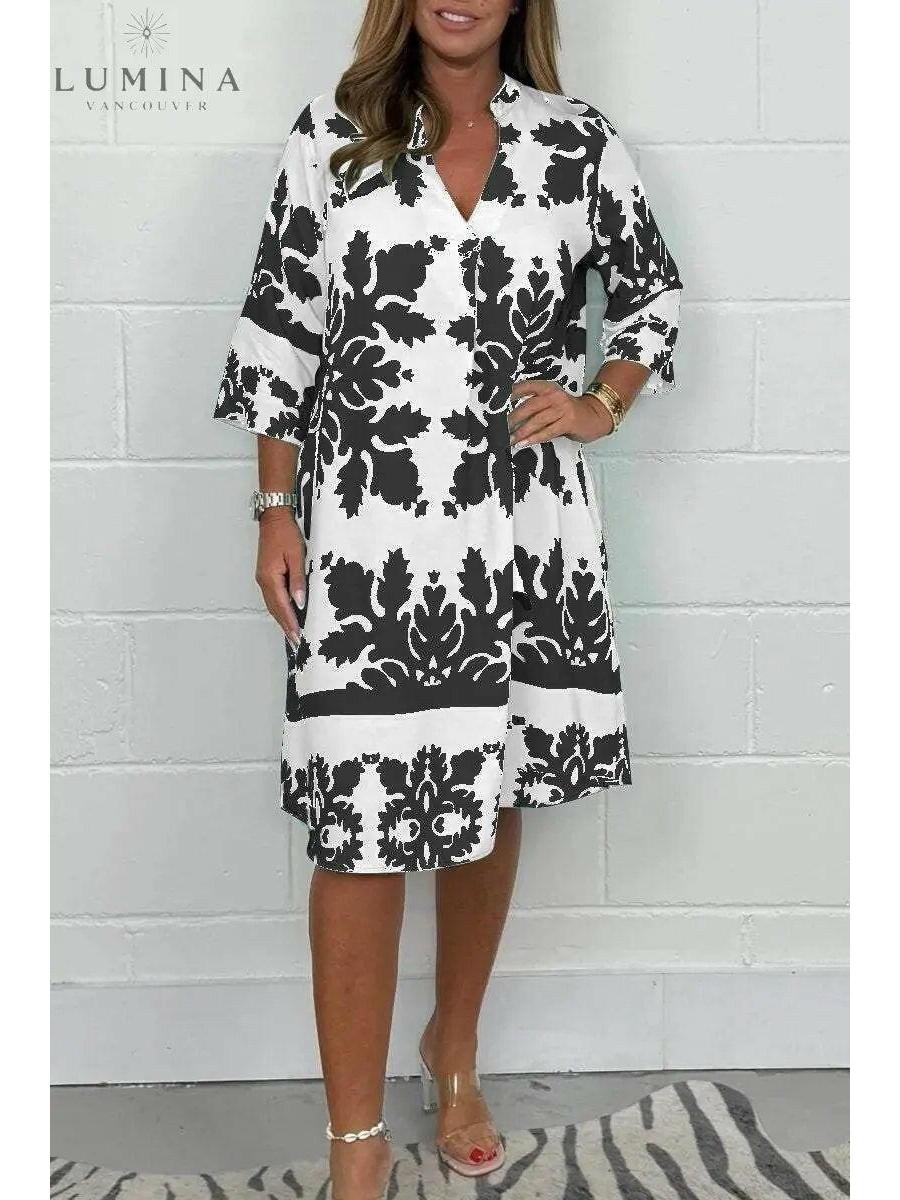 Blue and army green Bergljot spring dress by Lumina Vancouver, featuring a relaxed fit and floral pattern.