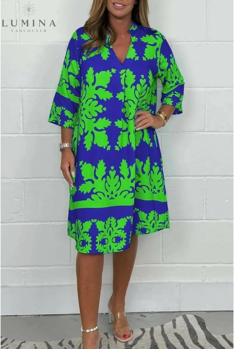 Lumina Wear Bergljot spring dress in blue and army green, featuring a flowy fabric and casual style, perfect for warm weather.