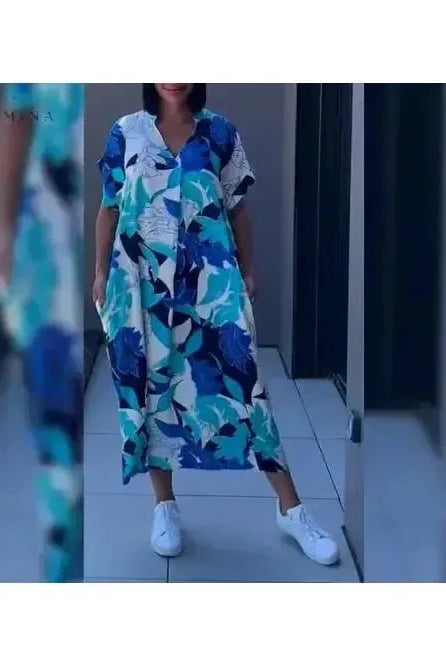Lumina Wear Terttu elegant blue dress with flowing fabric and stylish design, perfect for formal occasions.