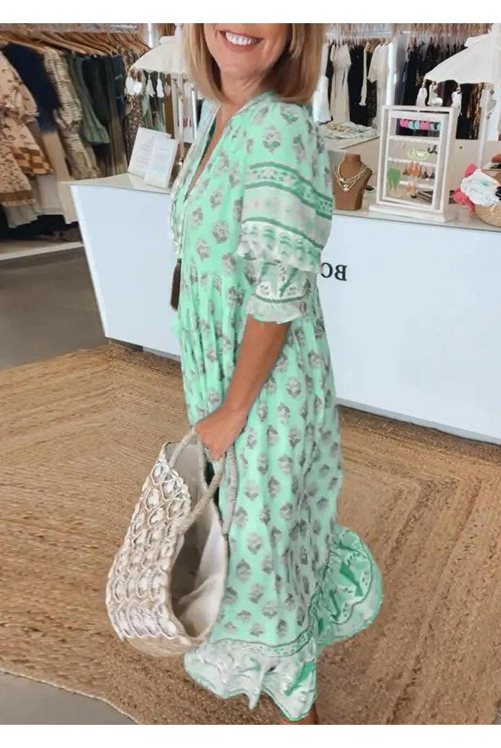 Lumina Wear Estrella casual half-sleeve maxi dress in Vancouver blue, flowing fabric with a relaxed fit and elegant design.
