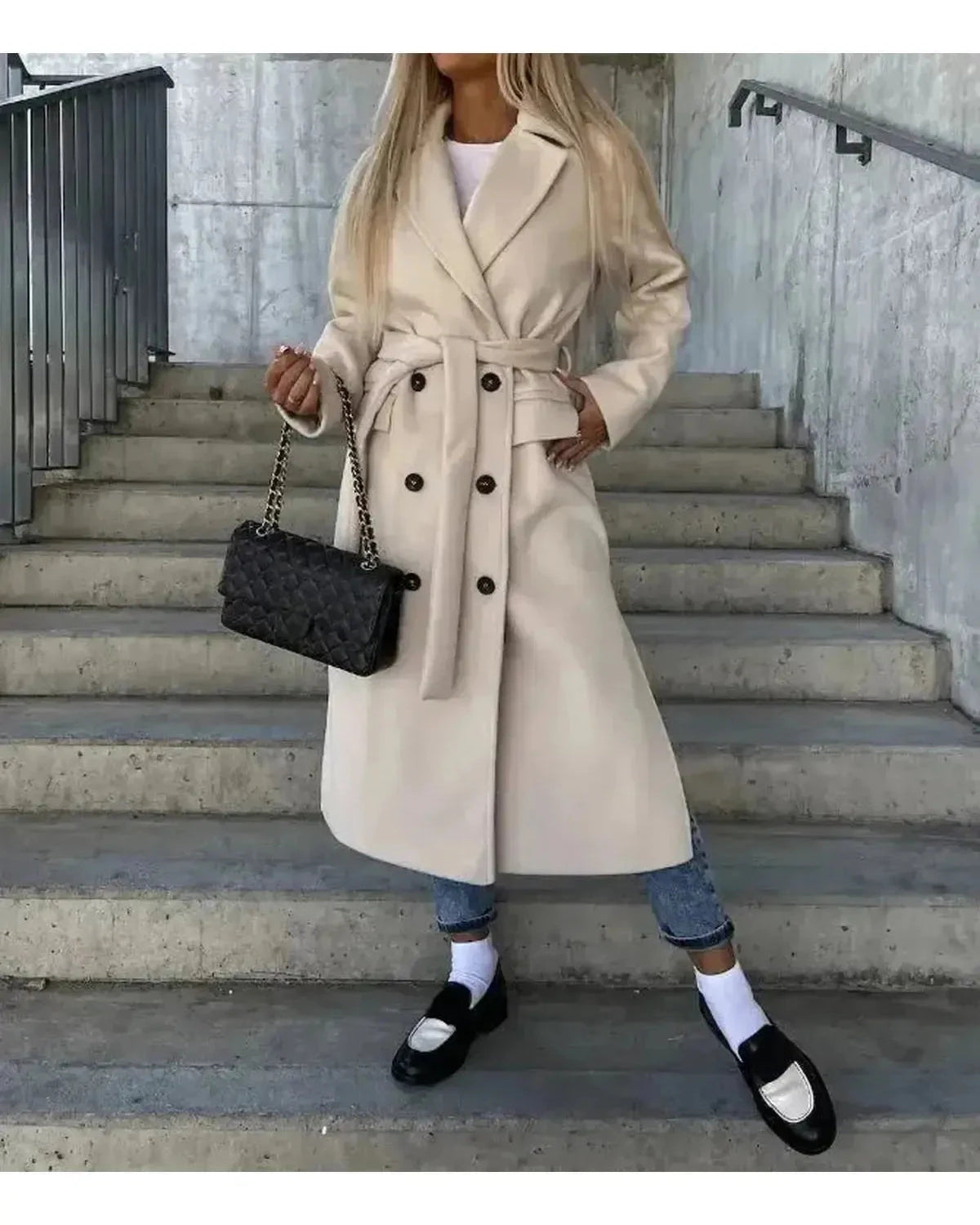 Lumina Wear Kim beige double-breasted wool coat, elegant and stylish, displayed on a hanger with a clean background.