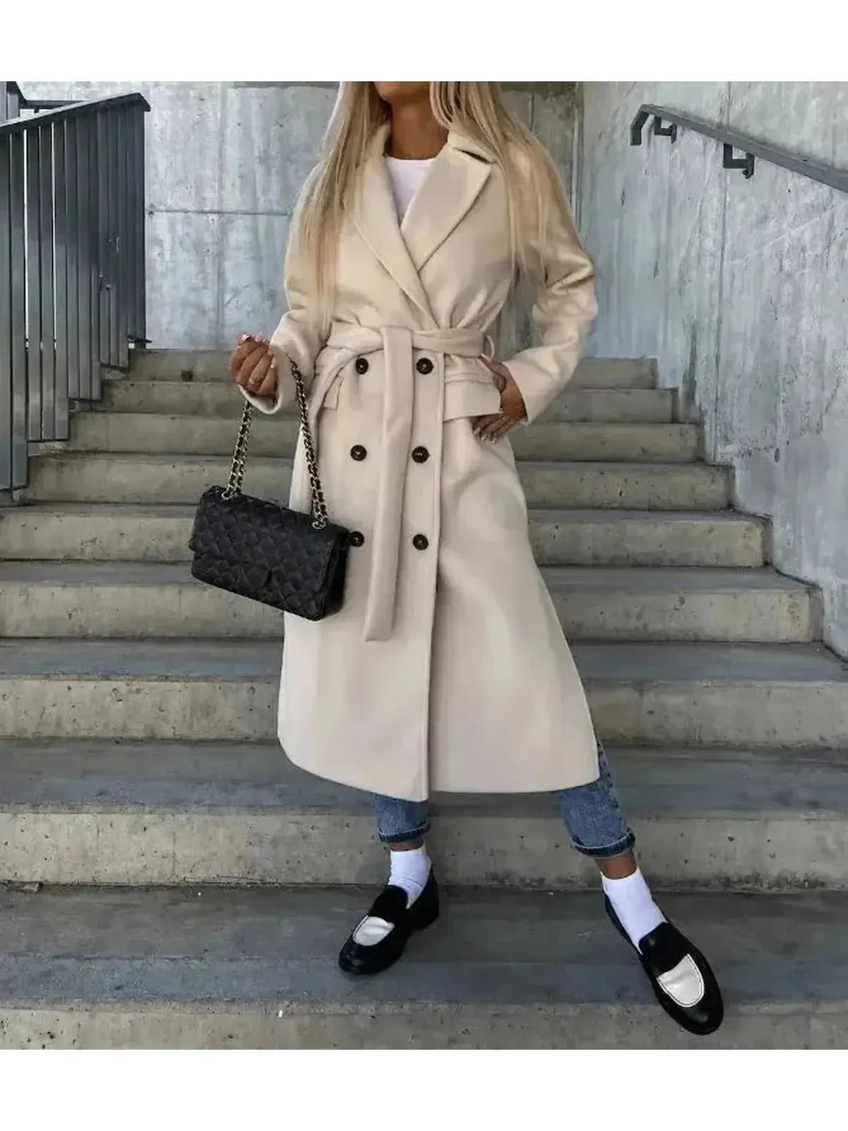 Beige Kim™ elegant double-breasted wool coat from Lumina Vancouver's CA-COLLECTIE-15 collection, shown on a model.