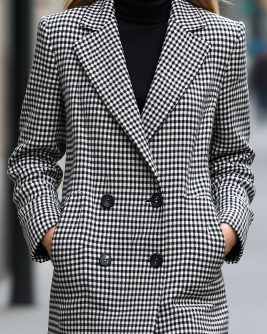Lumina Wear Enid double-breasted checked wool coat in black, featuring a stylish tailored design and classic plaid pattern.