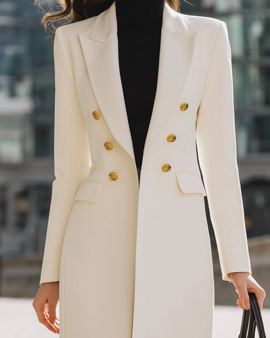 White double-breasted blazer coat by Lumina Wear featuring gold buttons, tailored fit, and stylish design.
