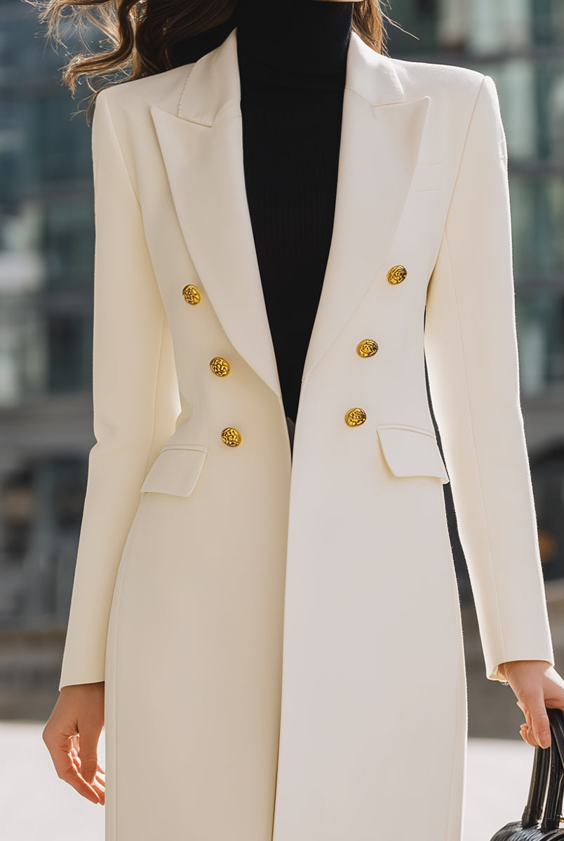 White Bernadette double-breasted blazer coat with gold button details, styled by Lumina Vancouver, shown on a model.