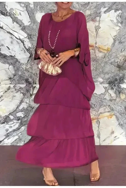 Dark green Caroline loose round neck dress by Lumina Vancouver, flowing fabric and relaxed fit perfect for casual or elegant wear.