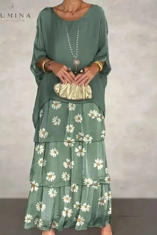 Dark green Caroline loose round neck dress by Lumina Vancouver, shown on a model with a relaxed fit and casual style.