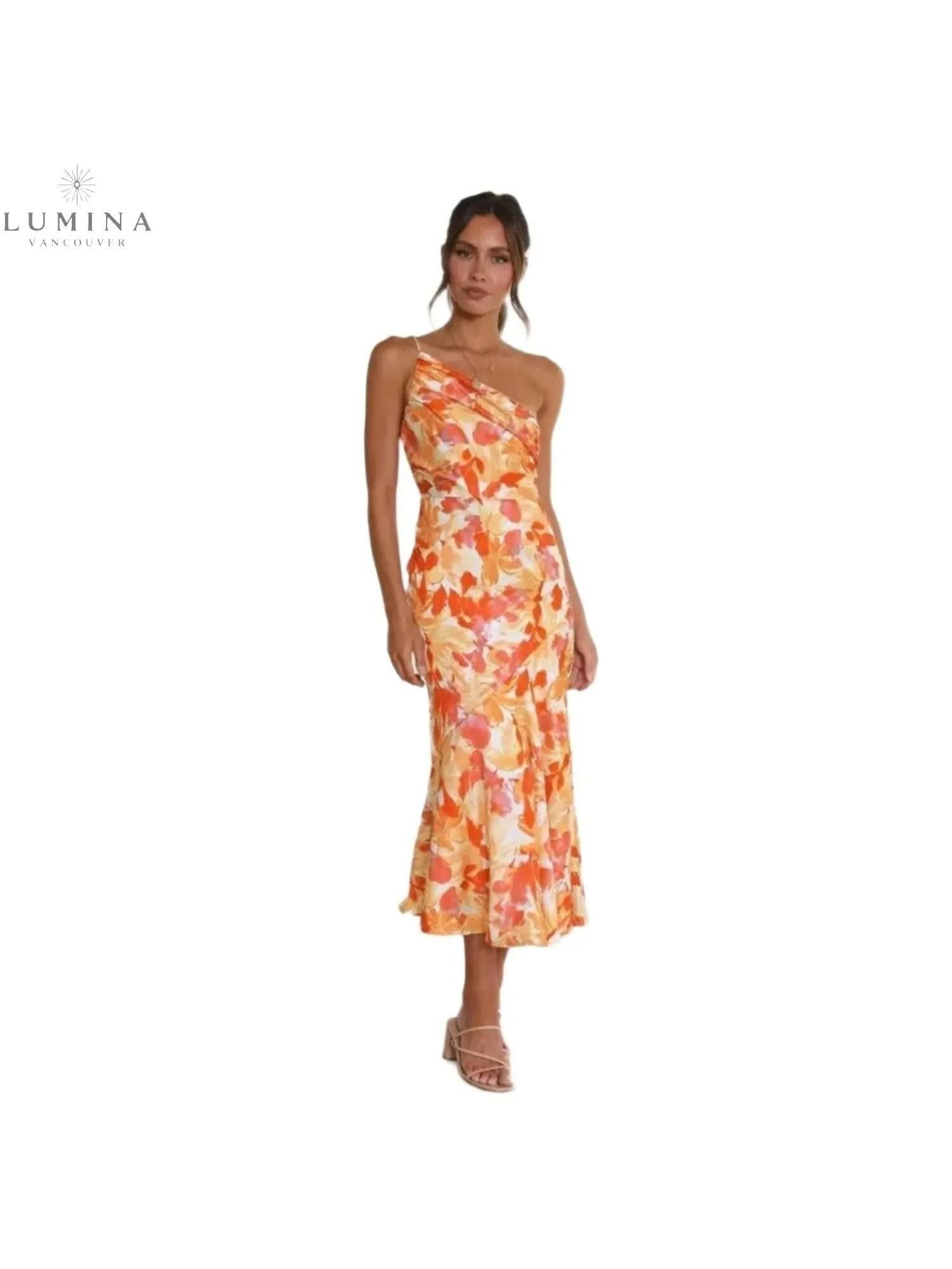 Lumina Vancouver Tiphaine floral patterned dress in orange with short sleeves and a fitted silhouette.