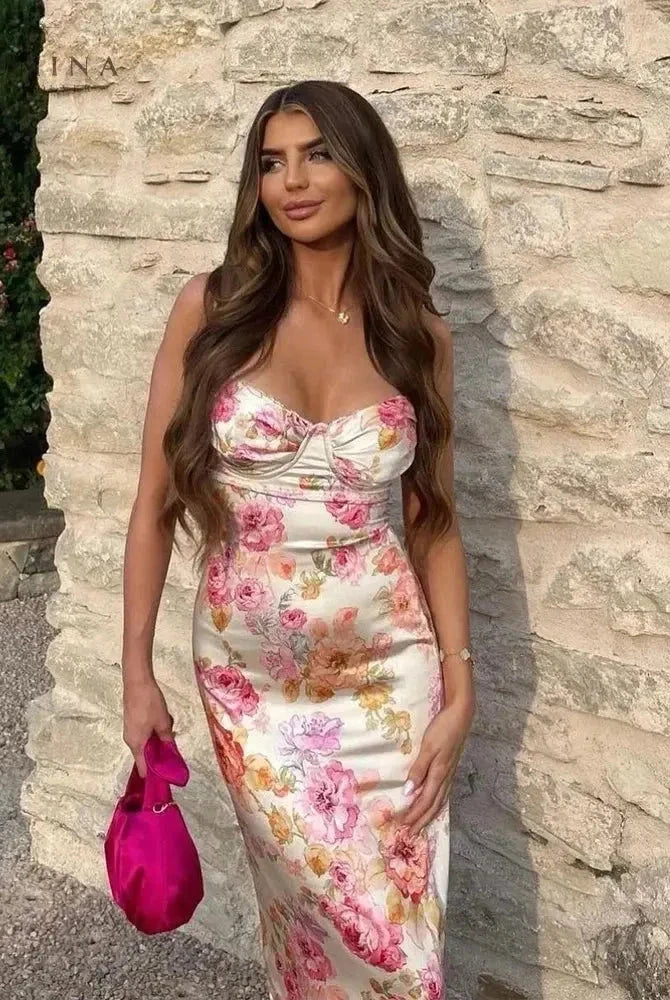 Lumina Wear Lucy floral satin maxi dress in XS, featuring a flowing design with vibrant floral patterns and elegant satin fabric.